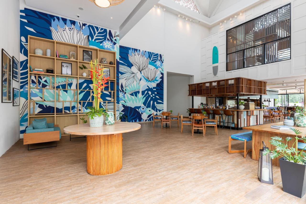 Outrigger Surin Beach Resort - Sha Extra Plus Екстер'єр фото The interior of the library